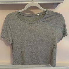 Lightweight Stretch Fit Crew Neck Cropped Above Waist Never Worn Gray Everyday Tops For Summer, Gray Tops For Everyday Summer Wear, Gray Summer Tops For Everyday, Casual Gray Cropped T-shirt For Summer, Simple Gray Summer Top, Casual Gray Crop Top For Everyday, Simple Scoop Neck Tops For Summer, Basic Gray Crop Top For Spring, Pacsun Tops