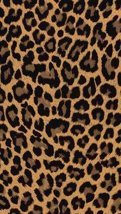 an animal print fabric with black and brown spots