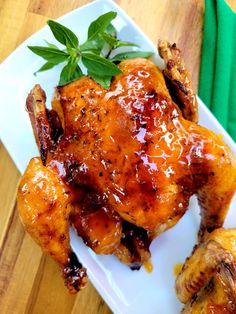 a close up of a chicken on a plate