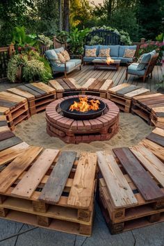 an outdoor fire pit made out of pallets and wooden planks, with seating around it