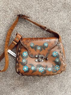 Beautifully hand painted vintage leather bag with adjustable strap Vintage Satchel Tote With Adjustable Handle, Vintage Hand Painted Rectangular Bag, Vintage Crossbody Satchel For Daily Use, Hand-painted Leather Tote Shoulder Bag, Hand Painted Leather Tote Shoulder Bag, Vintage Hand Tooled Tote Satchel, Vintage Style Hand Tooled Tote Satchel, Vintage Hand-tooled Tote Satchel, Vintage Tote Bag With Adjustable Handle