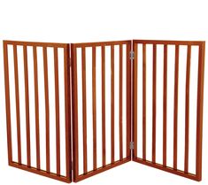 Help keep pets where they're supposed to be with this freestanding wooden gate. It quickly unfolds like an accordion and stands on its own to block access through double doors, wide hallways, in between couches, and more. From PETMAKER. Wooden Dog Gates, Wooden Pet Gate, Cat Gate, Dog Gates, Gate Lights, Wooden Sheds, Wooden Gates, Dog Gate, Pet Gate