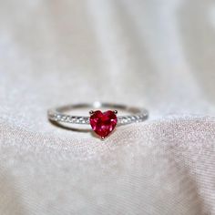 Introducing our Heart Cut Ring, the perfect gift for your loved one this holiday season! With its stunning crushed ice stone, this luxurious ringsparkles and shines like a diamond, adding a touch of elegance to any outfit. The beautiful red heart design symbolizes love and affection, making it an ideal present for Christmass. Treat your special someone to a gift they will cherish forever with our Heart Cut Ring. ✔ Ready to Ship in 1-2 Business Days .. ✔ Shipped to the Worldwide 1-5 business days Valentine's Day Ruby Ring Fine Jewelry, Diamond Heart Ring As A Gift, Valentine's Day Gift Ruby Ring With Diamond, Valentine's Day Gift Birthstone Ring, Red Cubic Zirconia Heart Ring For Promise, Red Cubic Zirconia Heart Promise Ring, Heart-shaped Solitaire Birthstone Ring Gift, Lab-created Ruby Rings For Valentine's Day Gift, Valentine's Day Ruby Ring With Accent Stones For Anniversary