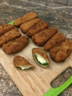 several pieces of food on a cutting board