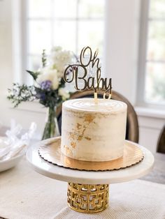 a white cake sitting on top of a table