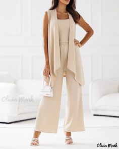 Olivia Mark - Three-Piece Ensemble: Sleeveless Camisole Top, Flared Leg Pants, and Matching Coat Sleeveless Jumpsuits And Rompers For Day Out, Fitted Sleeveless Sets For Fall, Versatile Sleeveless Vest With Pockets, Beige Sleeveless Sets For Spring, Casual Sleeveless Sets With Pockets, Casual Sleeveless Loungewear Sets, Chic Beige Sleeveless Set, Chic Sleeveless Sets For Fall, Chic Sleeveless Fall Sets