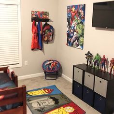 a bedroom with toys and decorations on the wall