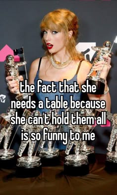 the fact that she needs a table because she can't hold them all is so funny to me