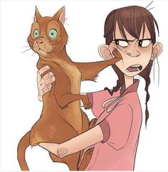 a girl is holding a cat in her arms and looking at the camera with an angry look on her face