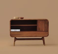 the sideboard is made out of wood and has an open shelf on one end