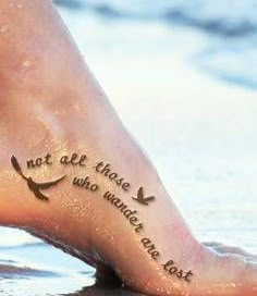 a person's foot with tattoos on it and the words, beautiful bohemian tattoo design ideas