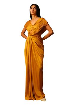 Mustard voile full length dress with criss cross pleated bodice. - Aza Fashions Silk Pleated V-neck Maxi Dress, Pre-draped Maxi Dress With Folds, Pre-draped V-neck Maxi Dress For Cocktail, Pre-draped V-neck Cocktail Evening Dress, Pleated V-neck Maxi Dress For Gala, Draped Pleated Maxi Dress For Wedding, Pleated Draped Maxi Dress For Wedding, V-neck Maxi Dress With Pleated Back For Gala, V-neck Gown With Ruched Bodice For Formal Occasions