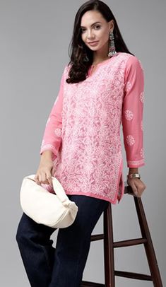 Pink chikankari kurti with full-length sleeves, white embroidery, high neck, best paired with jeans. Pink Kurti With Jeans, Pink Chikankari Kurti, Chikankari Short Kurti, Pink Colour Dress, Kurti With Jeans, Pink Kurti