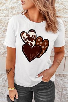 Express your style with our White Heart Graphic T-shirt. Made of 95%Polyester+5%Elastane, this casual tee features a heart-shaped pattern, perfect for Valentine's Day or the summer season. With a round neck, short sleeves, and a shift silhouette, it's lightweight and versatile for daily wear. Casual Short Sleeve T-shirt With Heart Print, White Short Sleeve T-shirt With Heart Print, White Casual T-shirt For Valentine's Day, Relaxed Fit T-shirt With Heart Print And Short Sleeves, Relaxed Fit Short Sleeve T-shirt With Heart Print, Relaxed Fit T-shirt With Heart Print, Casual Heart Print Short Sleeve T-shirt, Casual Relaxed Fit T-shirt With Heart Print, Casual Valentine's Day T-shirt With Heart Graphic