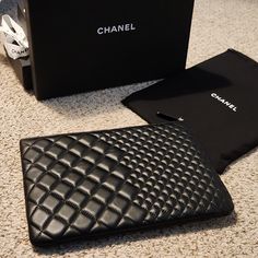 Authentic Chanel Clutch In Black Lambskin Leather With Light Gold Hardware Dimensions: Approx 11in X 8in X .5in In Excellent Condition! No Trades Chanel Clutch, Chanel Bags, Lambskin Leather, Chanel Bag, Gold Hardware, Chanel, Bag Lady, Leather, Gold