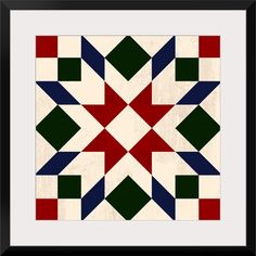 an abstract geometric design with red, green and blue squares on white paper in a black frame