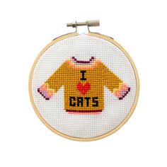 a cross stitch pattern with the words i love dats in black and yellow on it