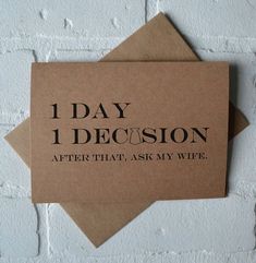 two brown envelopes sitting on top of each other with the words 1 day decision after that, ask my wife