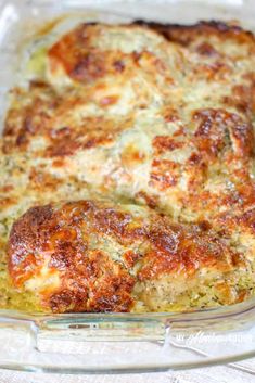 a casserole dish with meat and cheese in it