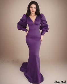 Olivia Mark - Formal Evening Gown with Open Back and Sheer Fabric - Ideal for Sophisticated Occasions Elegant Purple V-neck Gown, Purple Fitted V-neck Gown, Fitted Purple V-neck Evening Dress, Elegant Solid Color Evening Gown, Fitted Long Sleeve Purple Gown, Purple Fitted Long Sleeve Gown, Fitted Satin Gown For Formal Occasions, Solid Fitted Gala Dress, Purple Long Sleeve Evening Gown