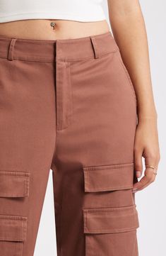 These trend-right pants are crafted from a durable cotton blend with cargo pockets for a utilitarian vibe. 32" inseam; 21" leg opening; 12" front rise; 14 1/2" back rise (size 29) 49% cotton, 48% lyocell, 3% spandex Machine wash, line dry Imported Fitted Cotton Cargo Shorts With Pockets, Fall Cotton Cargo Pants With Pockets, Cotton Bottoms With Flap Pockets For Fall, Fall Cotton Bottoms With Flap Pockets, Cotton Cargo Jeans With Multiple Pockets For Work, Fall Cotton Bottoms With Multiple Pockets, Mid-rise Cotton Utility Cargo Pants, Fitted Cotton Bottoms With Multiple Pockets, Fall Mid-rise Cargo Pants With Patch Pockets