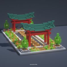 an image of a model of a japanese style structure with trees and flowers in the foreground