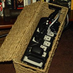 a wicker basket with an electronic device in it