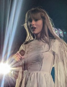 taylor swift performs on stage at the brity awards in london, england as part of her tour