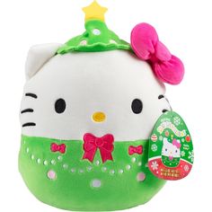 a hello kitty stuffed animal with a bow on it's head