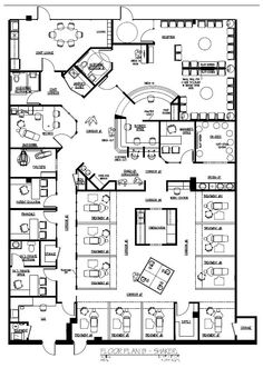 an office floor plan with several desks and chairs, including one in the middle