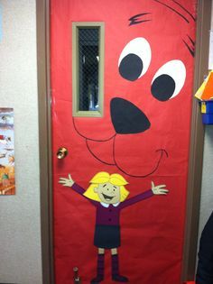 a red door with a cartoon character painted on it