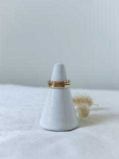 This 14k Ridge Ring is a unique addition to any jewelry box. Carefully carved ridges create a subtle bamboo effect. 14k Solid Gold Width is approximately 1.2mm Each ridge is hand filed into the ring, placement of each may vary slightly Half sizes are available. Simply leave a note with your size during checkout *14k Gold rings are made to order. Please allow an extra 3-4 business days for production.* Ring Placement, Hammered Band, Solid Gold Band, 14k Gold Ring, Gold Bands, Solid Gold, Gold Filled, Gold Rings, Jewelry Box