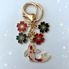 🌸kawaii fan keychain, Sakura fan cherry blossom keyring, keychain with metal enamel charms. Add house or car keys so you never forget them.  🌸Pretty addition to back pack gym locker key decor . Great on handbag / back laptop case.  🌸lightweight floral charms on gold coloured keyring and clip  🌸Four black 1.5cm flower fan charms , koi fish 2.8cm with drop of 9cm  🌸combined postage international sales welcome You might notice I have lots of sakura flowers  on my shop designs.  Cherry Blossoms are also known as sakura in Japan. Japanese culture recognises the short-lived life span of the flower . When cherry blossoms bloom, they flourish and fall from their trees two weeks later. This is seen as metaphor for our fleeting lives and the reminder to live life to the full in all its wonderfu Anime Bag, Embroidery Purse, Chinese Flower, Kawaii Bag, Japanese Sakura, Cell Phone Charms, Japanese Fan, Carpe Koi, Japanese Gifts