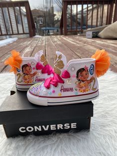 a pair of shoes with princess moan on them