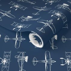 a blueprinted wallpaper with airplanes and planes in white on a dark background