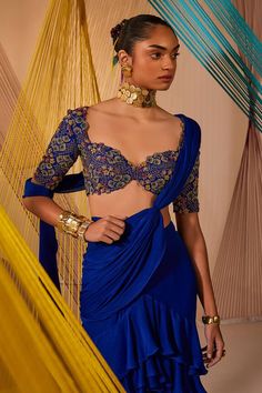 Royal blue pre-draped ruffle saree in satin chiffon base. Comes with a raw silk padded blouse with resham knots, zardosi and badla jaal hand embroidery. - Aza Fashions Fitted Lehenga With Draped Sleeves And Traditional Drape, Fitted Pre-draped Saree With Draped Sleeves For Diwali, Fitted Blue Pre-draped Saree For Festive Occasions, Fitted Blue Georgette Blouse Piece, Fitted Silk Blouse With Draped Sleeves, Blue Fitted Pre-draped Saree, Designer Wear Fitted Lehenga With Draped Sleeves, Designer Fitted Lehenga With Draped Sleeves, Fitted Saree With Draped Sleeves For Festive Occasions