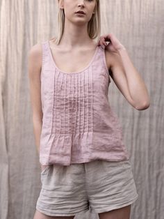 "Slightly tapered linen ladies top with straps. Great, loose, simple and most importantly, comfortable linen. Pair with our linen shorts and pants. Authentic hand-made. French seems. DETAILS: - 100% washed, softened, light linen - Includes one linen top - The images above show the \"natural linen\", \"heather\" and \"rose\" colour - Pleats detail at the front - Bust darts to shape any figure - Shrinkage after the first wash up to 3% - Does not contain any synthetic admixtures - Does not cause al Solid Linen Summer Tank Top, Beige Linen Tank Top For Summer, Linen Tops Women Summer Outfits, Linen Blouse Designs, Summer Layers, Linen Tops, Modern Packaging, Linen Top Women, Dresses Romantic