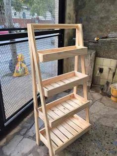 a wooden shelf sitting on top of a stone floor