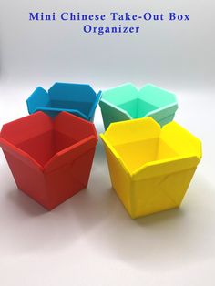 three different colored boxes sitting next to each other on a white surface with the words mini chinese take - out box organizer