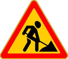 a yellow and red triangle sign with a man digging