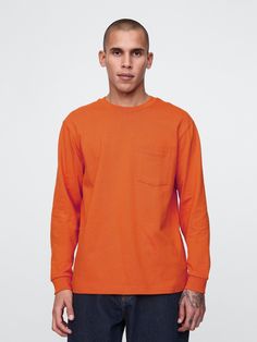 Soft, heavyweight cotton pocket T-shirt.  Crewneck.  Long sleeves.  Patch pocket at chest.  Fit: Relaxed.  A straight & easy fit with a relaxed sleeve.  For a Classic fit, go down one Pocket Tshirt, New Woman, Patch Pocket, Baby Toddler, Gap, Crew Neck, Orange, Long Sleeve