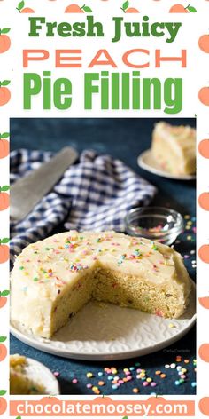 a piece of cake with white frosting and sprinkles is on a plate