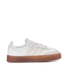 These adidas Sambae women's shoes add a modern twist to an iconic Samba design. Once an indoor football shoe, this version is made with a smooth leather upper, translucent gum rubber platform outsole, and premium embroidered 3-Stripes that let the look transition seamlessly to the streets. Subtle details like a stitch-and-turn toe cap make a stylish statement. Features: Regular fit fits just right. Lace closure for a secure and customized fit. Textile lining keeps feet comfortable. Stitch-and-tu Platform Sambas, Samba Platform, Adidas Cream Sneakers With Laces, Cream Adidas Lace-up Sneakers, White Adidas Lace-up Platform Sneakers, Adidas Samba All White, Adidas Cream Low-top Sneakers, Nike Fits, Indoor Football