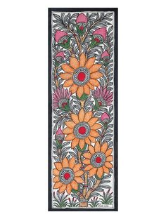 an intricately designed wall hanging with orange flowers