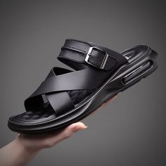 Casual Shoes: Stay Cool and Comfortable in These Genuine Leather Men's Summer Sandals! Hey there! Check out these awesome summer sandals for men - they're made of genuine leather and come in black or brown. Perfect for beach vacations or just casual wear! These sandals have a soft, non-slip sole and a flat heel height of 1cm or less, so you can wear them comfortably all day long. They feature a basic sandal design with a solid color pattern and a fashion element of sewing. The upper material is Black Leather Beach Slides, Leather Slide Flip Flops For Outdoor, Black Leather Slides For Beach, Black Leather Slides For The Beach, Black Leather Slide Sport Sandals, Black Leather Sport Sandals For Summer, Black Sport Sandals With Leather Footbed For Summer, Black Leather Footbed Sport Sandals For Summer, Black Leather Sandals For Outdoor