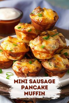 mini sausage pancake muffins on a white plate