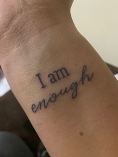 i am enough tattoo on the wrist