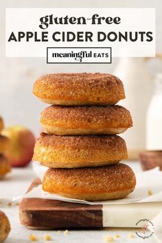 an apple cider donuts stacked on top of each other with the text gluten free apple cider donuts