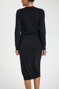 Grace meets functionality with the Avery Midi Dress. The slim-fit design, adorned with a V-neck and long sleeves, captures timeless elegance. A removable self-tie belt allows you to style the dress as you wish, and the button-front closure adds a chic finish. Slim Fit V-Neck Long-Sleeve Midi Length Removeable Self Tie Belt Button Front 95% Cashmere 5% Elastane Hand wash or dry clean. Lay to dry flat. Model is 5'9" wearing size SM Men's Denim Style, Cashmere Sweater Dress, Curvy Pants, Safari Jacket, Mens Button Up, Long Sleeve Midi, Fall Shopping, Jacket Sale, Cashmere Sweater