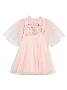 Introducing the Shanti Aria Tulle Dress, where grace meets beauty. Featuring delicate tulle bell sleeves and a full a-line skirt, this dress is perfect for special occasions. Hand-embellished flowers cascade across the bodice, leaving your little one feeling like a flower in full bloom! Shipping and Returns This product can be returned/exchanged within 20 days of receiving the item. All orders are dispatched from our Sydney, Australia warehouse. SHIPPING EST. TIMEFRAME FREE FOR ORDERS OVER Inter Luxury Pearl Embroidered Dress For Festivals, Long Sleeve Tulle Dress Kids, Pink Floral Applique Whimsical Tutu Dress, Festive Pink Pearl-embroidered Fabric, Pink Sequin Dress Toddler, Aria Dress, Net Fabric, Girls Party, Tulle Dress